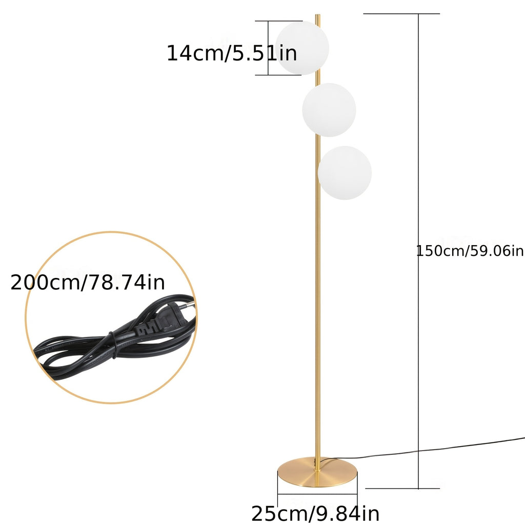 Lampe de bureau sur pied dorée à trois globes de verre blanc