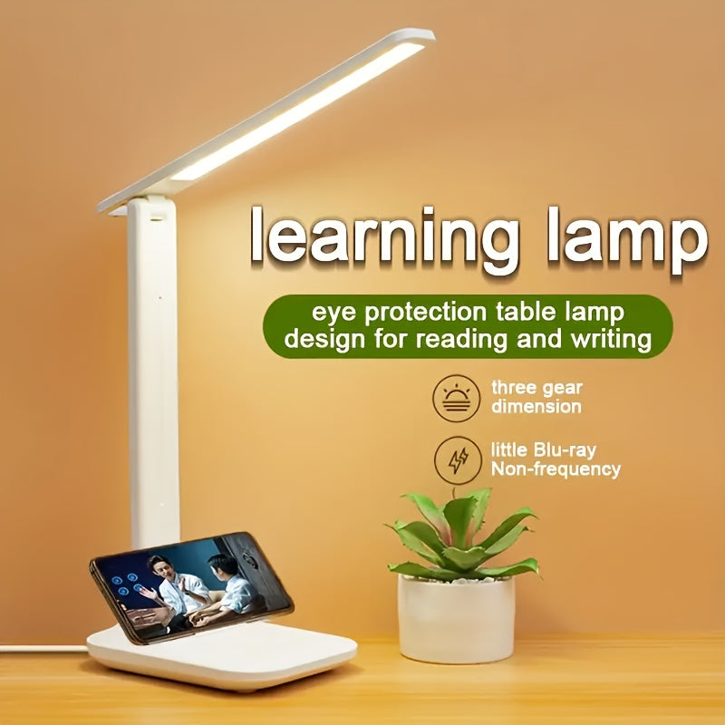Lampe de bureau pliante avec support de téléphone intégré