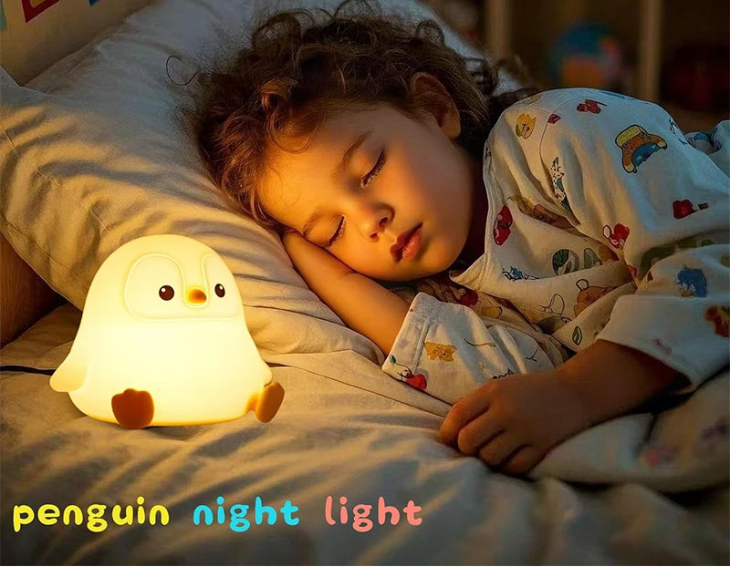 Veilleuse pingouin en silicone - LED tactile rechargeable — photo 1